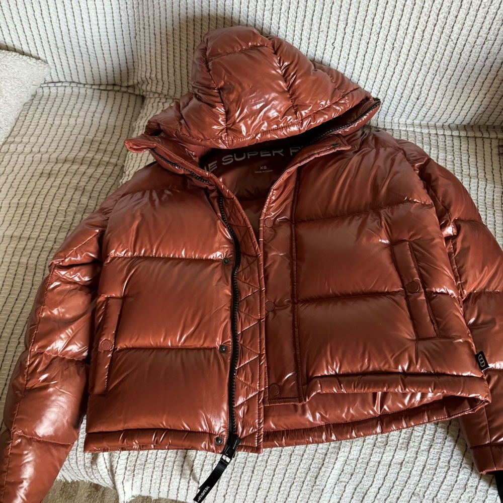 aritzia super puff shorty in high gloss rich copper